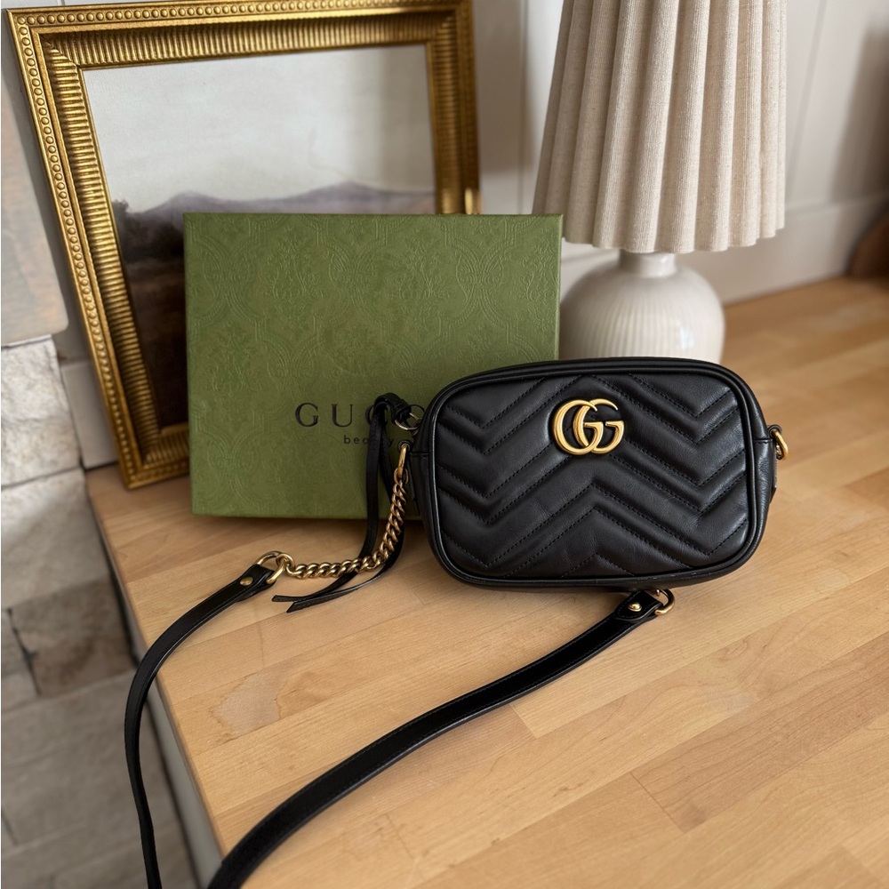 Gucci Black Crossbody Bag with Gold Accents
